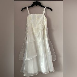 Beautiful long white a-line dress with spaghetti streps.  Tie back sash. Size 10